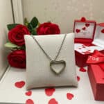 50 BMG Bullet Casing Heart Keychain Necklace in romantic valentines day setting